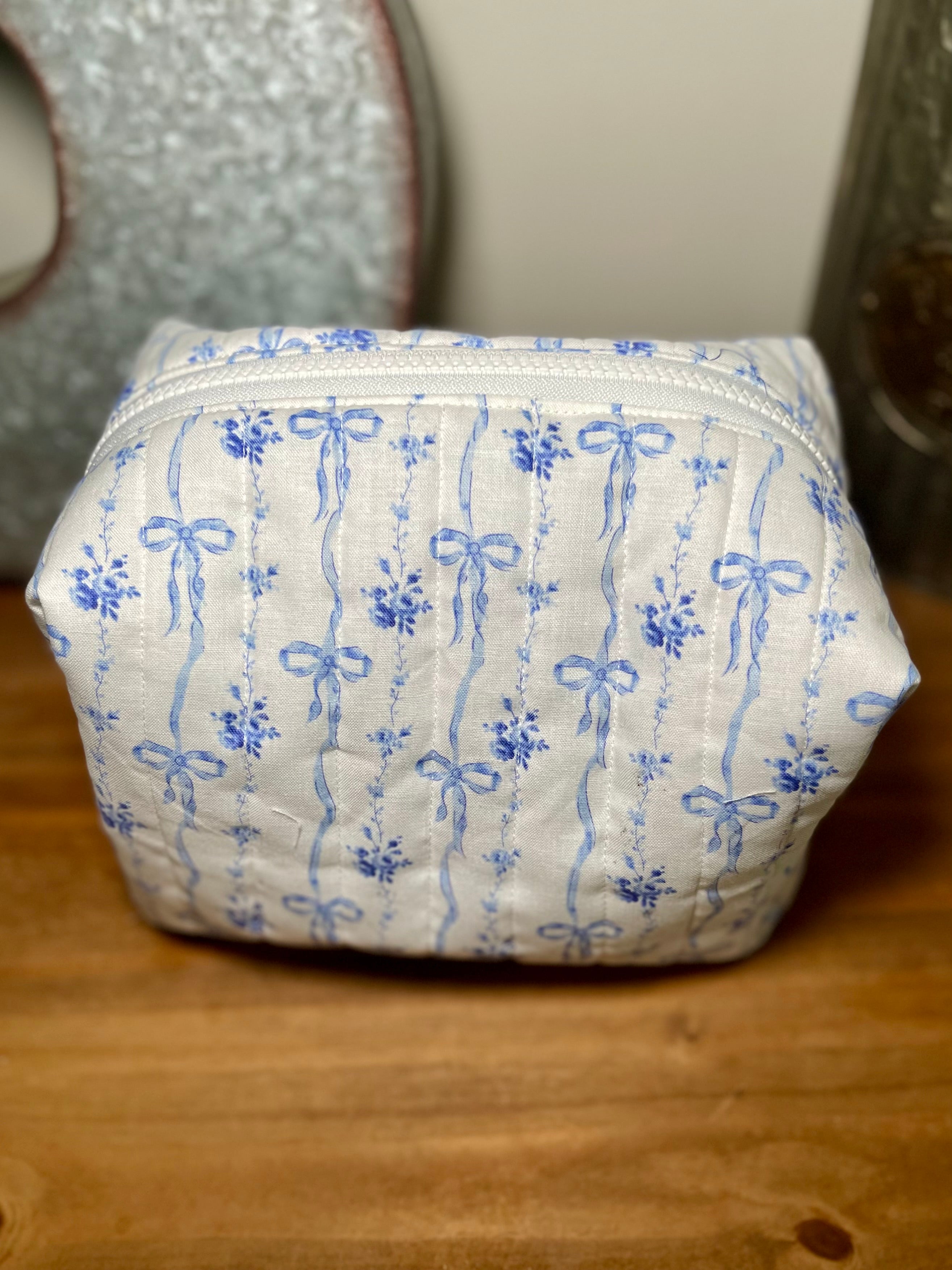 Blue Ribbon Bloom Quilted Makeup Bag | Signature Pouch